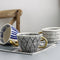 Artiphy | Elegant Ceramic Coffee Cup with Gold Handle and Geometric Design
