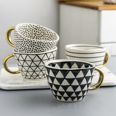 BowLift | Elegant Ceramic Coffee Cup with Gold Handle and Geometric Design 4