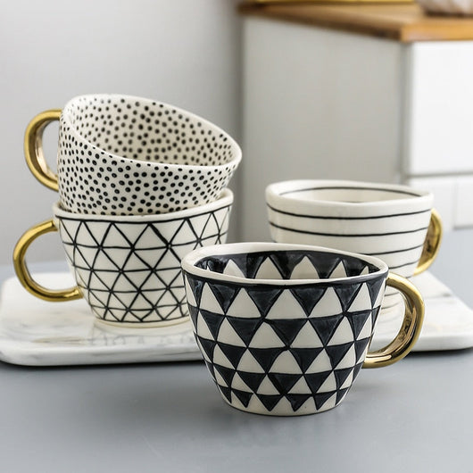 BowLift | Elegant Ceramic Coffee Cup with Gold Handle and Geometric Design 4