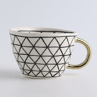 BowLift | Elegant Ceramic Coffee Cup with Gold Handle and Geometric Design 5