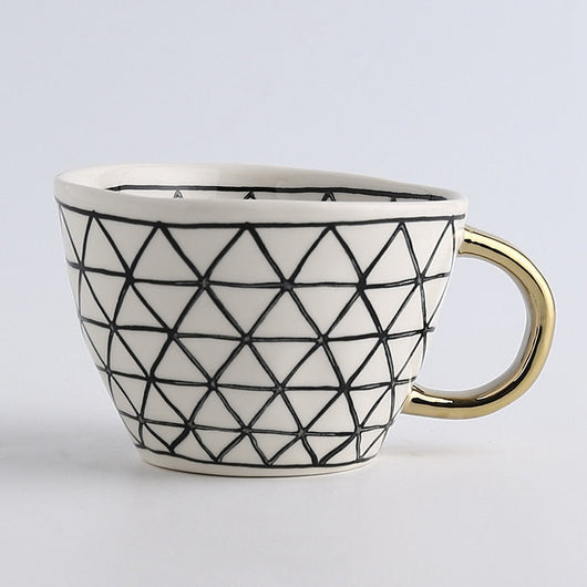 BowLift | Elegant Ceramic Coffee Cup with Gold Handle and Geometric Design 5